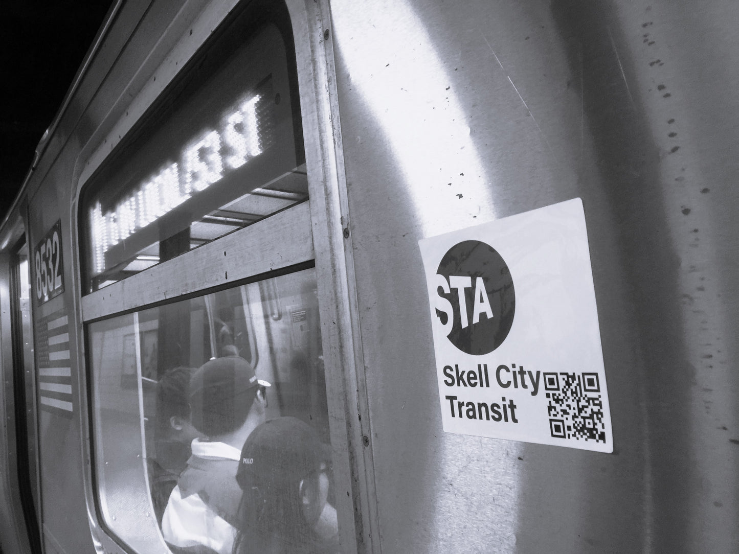 MTA station sticker, from skell city attached to the side of subway car.