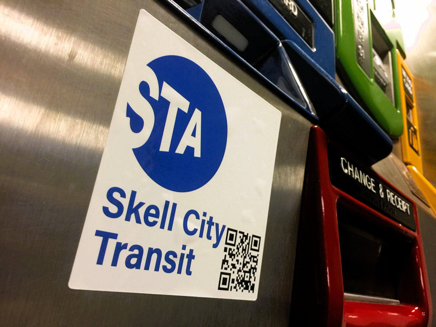 MTA Skell city station sticker attached to a metrocard fare kiosk.