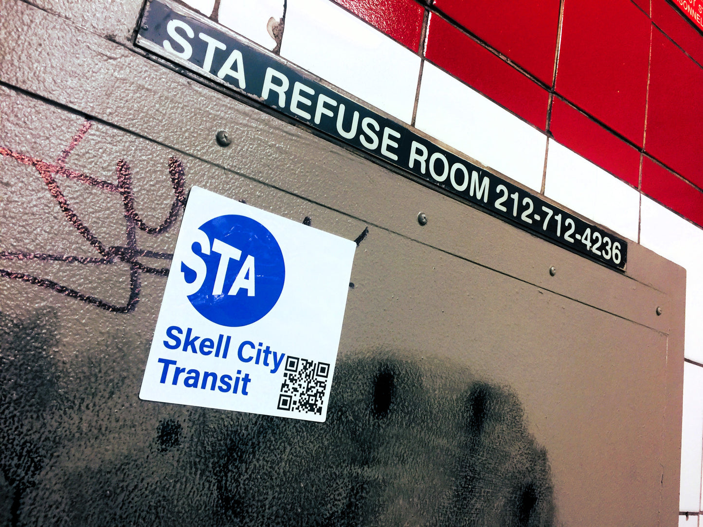 MTA Skell city sticker on station refuse room door, with graffiti.