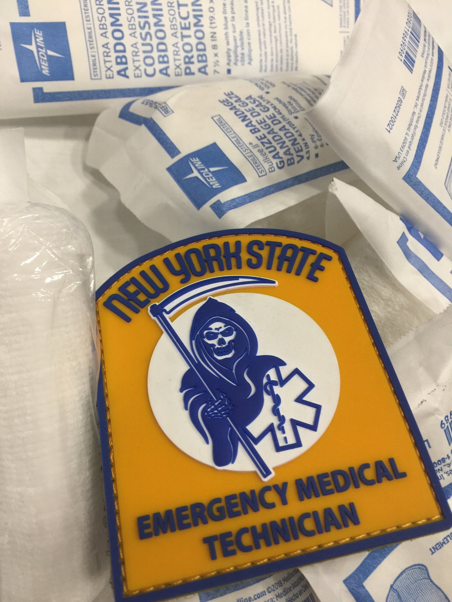 new york state skell city reaper EMT Velcro PVC patch on top of gauze cling bandage rolls 