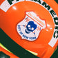 NYC skell city EMS Paramedic patch reflective sticker on the side of an orange ems bunker gear helmet.