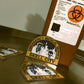 NYC EMS HHC patch reflective stickers spread out next to a covidien biohazard sharps container.