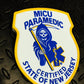 Skell City New Jersey MICU Paramedic PVC Velcro Patch up against steel gray gridiron background