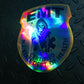 NJ EMT Patch in a holographic sticker against a dark gray gridiron background.