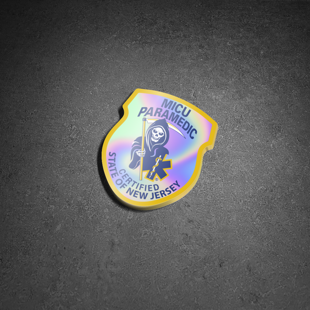 New jersey MICU Paramedic patch Holographic Sticker from skellcity on a concrete street background.