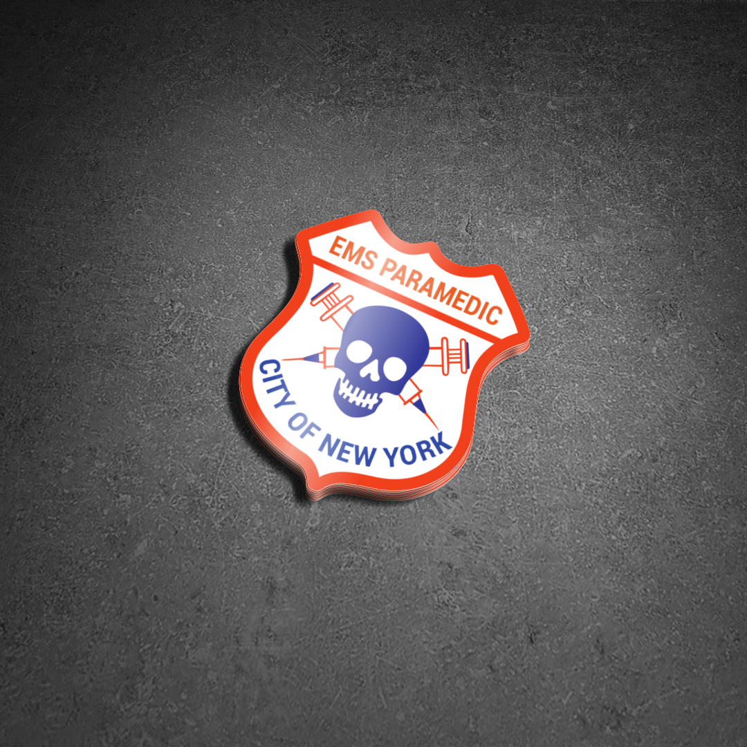 New York City EMS Paramedic Patch Glossy Sticker on a Black Concrete Background.